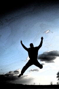 Man leaping into air