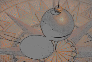 dangling pendulum over a painted floor
